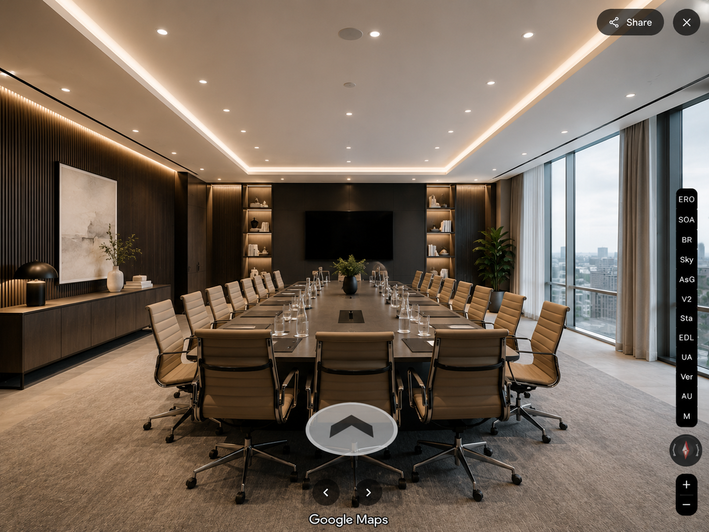Preview of a 360° virtual tour of a conference room shown on a laptop